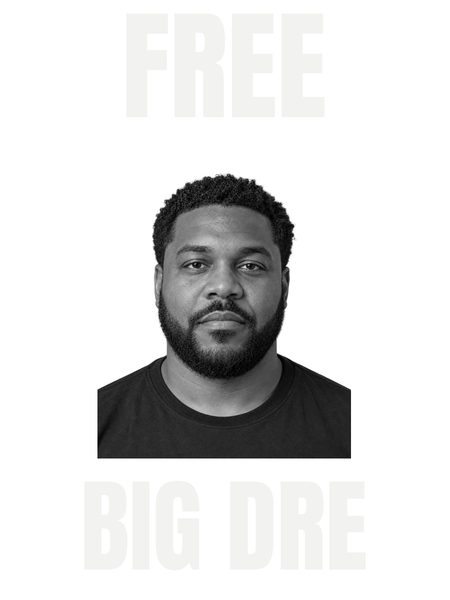 Black tee with a black-and-white portrait and FREE BIG DRE in Block lettering